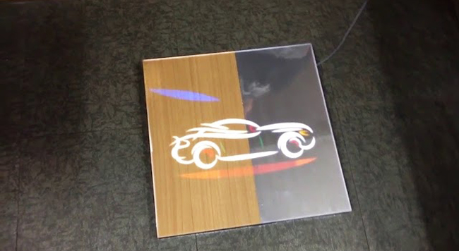 隐藏式木纹显示屏激光打孔技术-实现无痕透气与美学融合(图1)